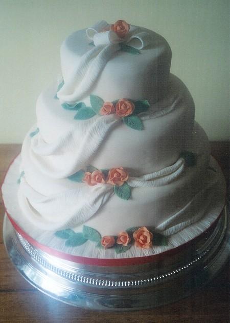 Flowers and Drapes Wedding Cake  Ref IC709