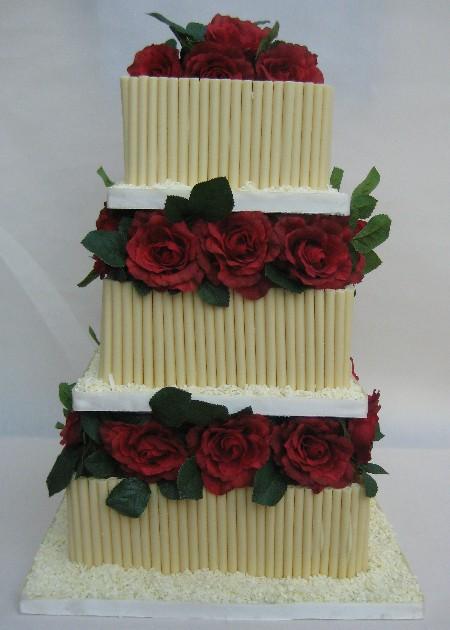 Square chocolate curl with red roses wedding cake Ref CW036