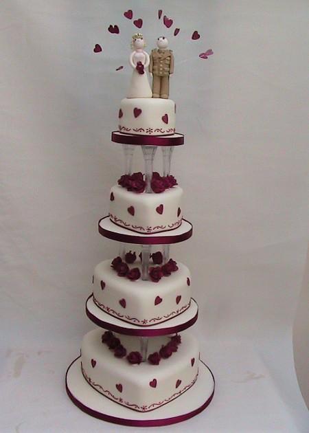 Four tiered heart cake with roses ref IC088